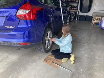 Greta Learning to Change Tire2